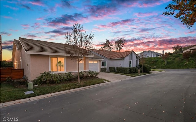 view of front of property featuring a garage