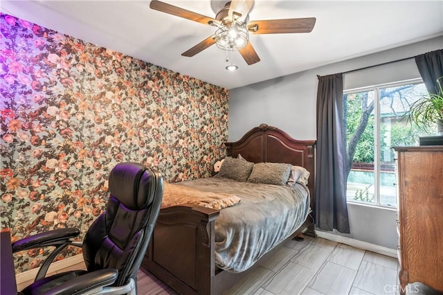 bedroom featuring ceiling fan