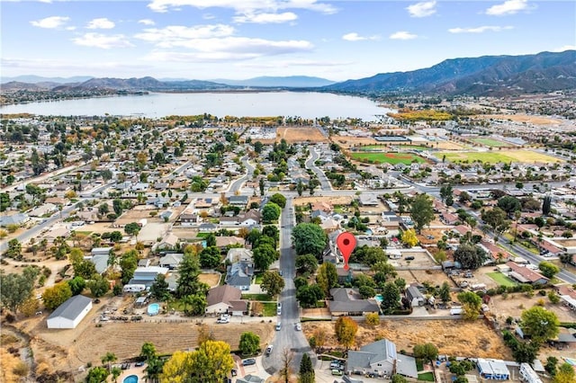 bird's eye view featuring a water and mountain view