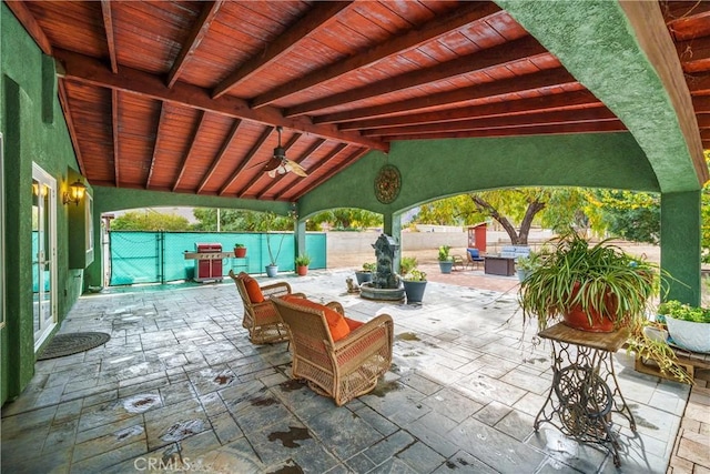 view of patio / terrace featuring ceiling fan and grilling area