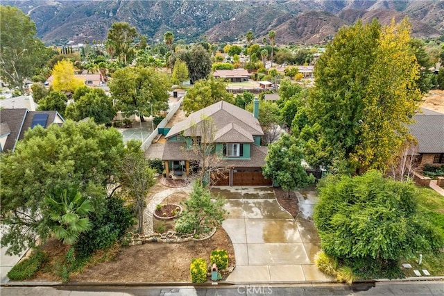 drone / aerial view featuring a mountain view