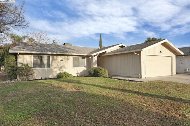 ranch-style house with a front yard and a garage