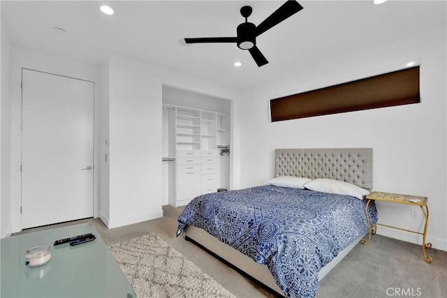 bedroom featuring ceiling fan and a closet