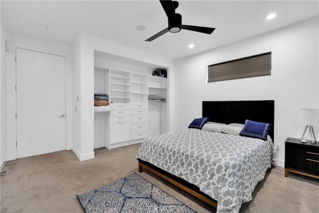 carpeted bedroom featuring ceiling fan