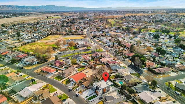 bird's eye view with a mountain view