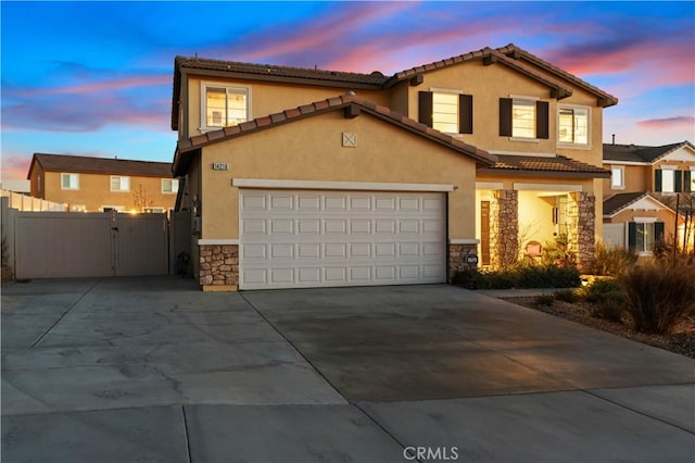 view of front of home with a garage