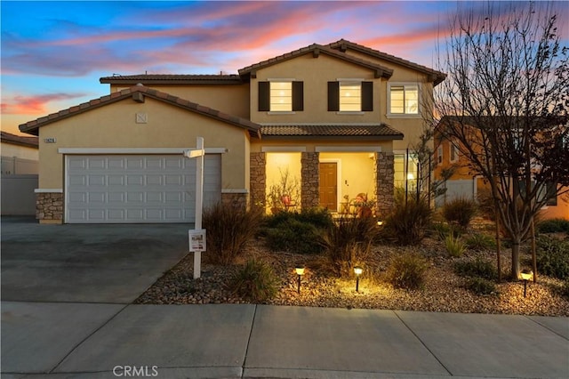 view of front of home featuring a garage