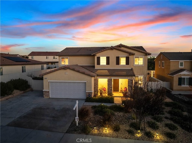 view of front of home featuring a garage