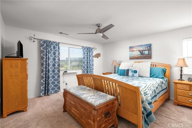 bedroom with light colored carpet and ceiling fan