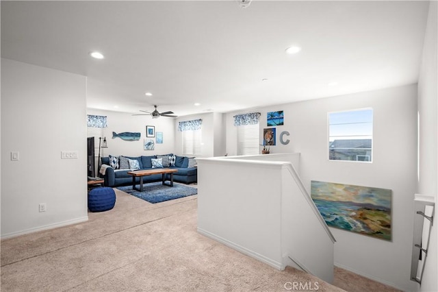 carpeted living room featuring a wealth of natural light