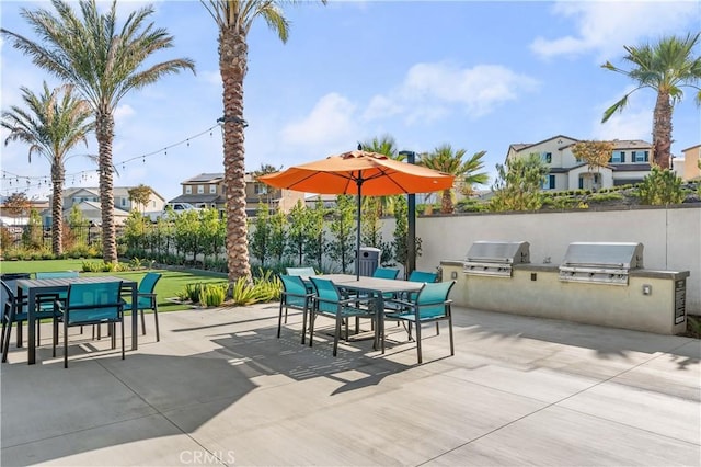 view of patio featuring grilling area and exterior kitchen