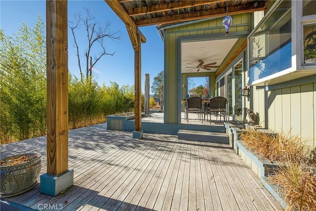 wooden deck with ceiling fan