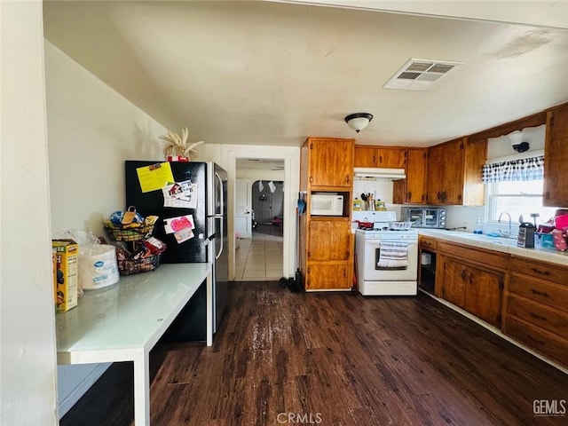 7805 Panama Rd, Lamont, CA 93241 - kitchen with white appliances, dark hardwood / wood-style floors, and sink