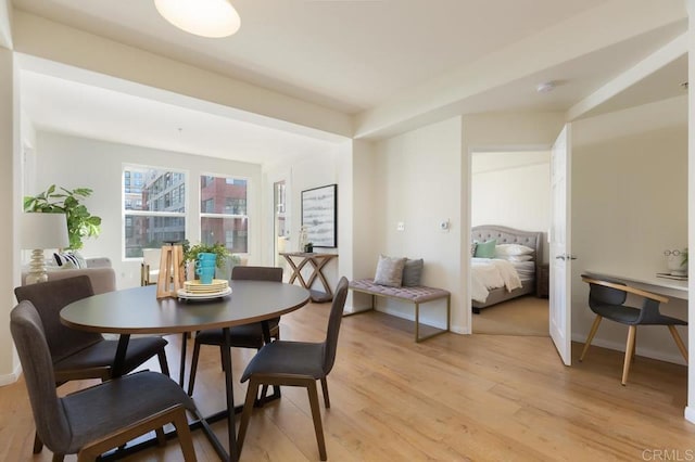 dining room featuring light hardwood / wood-style floors