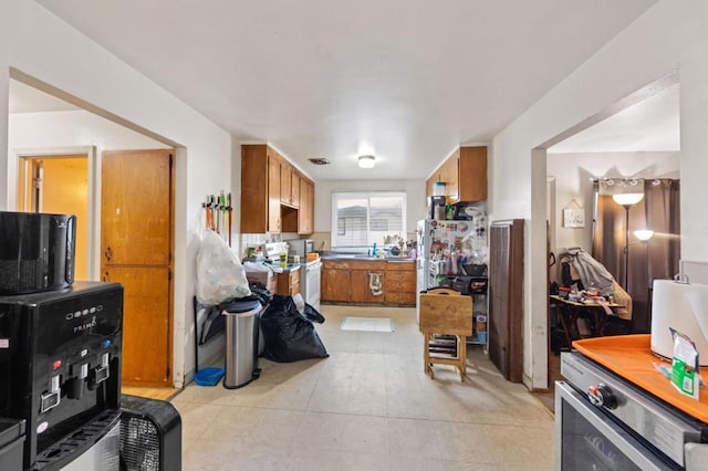 kitchen featuring white electric stove