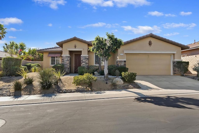 view of front of home with a garage