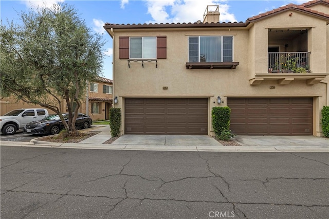 view of front of property with a garage