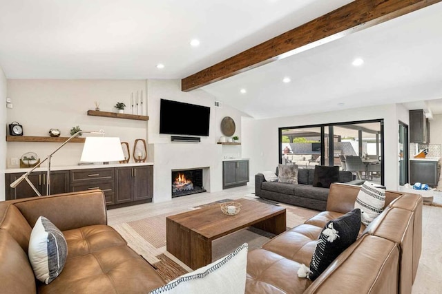 living room featuring vaulted ceiling with beams