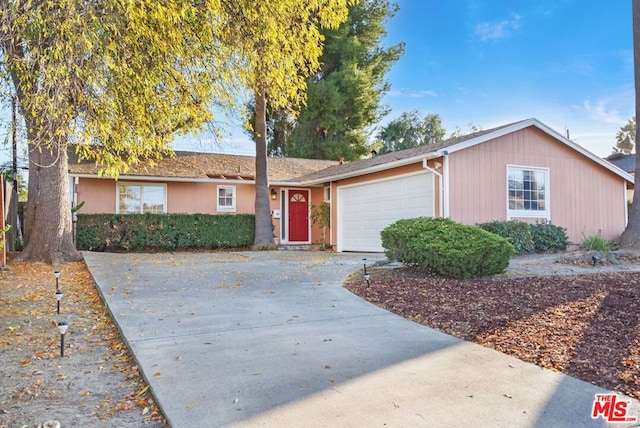 single story home with a garage