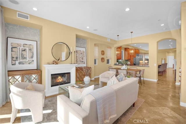 living room featuring a chandelier