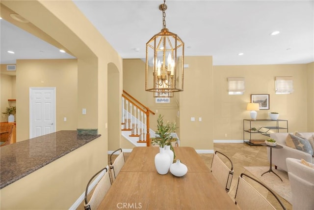 dining room featuring a chandelier