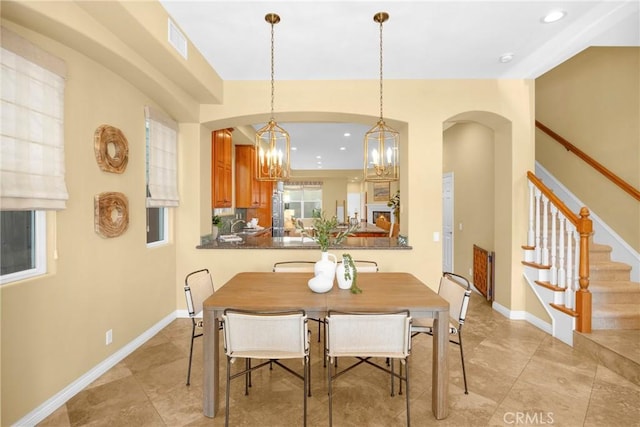 dining area featuring a chandelier