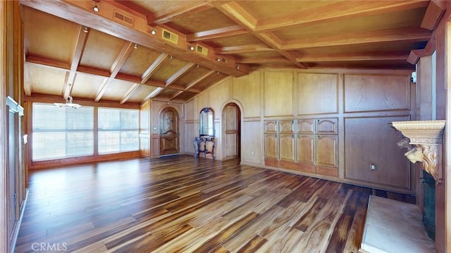 unfurnished living room featuring lofted ceiling with beams, visible vents, wood walls, and dark wood-style flooring