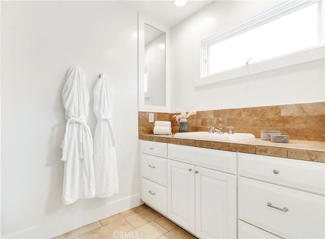 bathroom featuring tile patterned floors and vanity