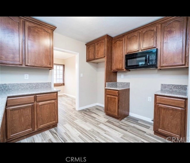 kitchen featuring light hardwood / wood-style flooring