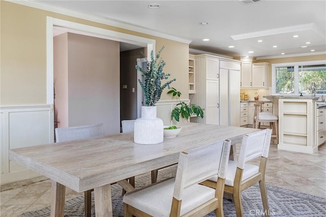 dining room with crown molding