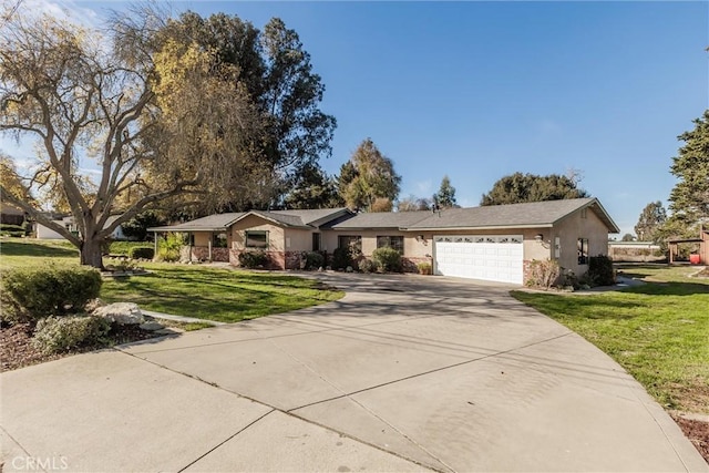 single story home with a garage and a front lawn