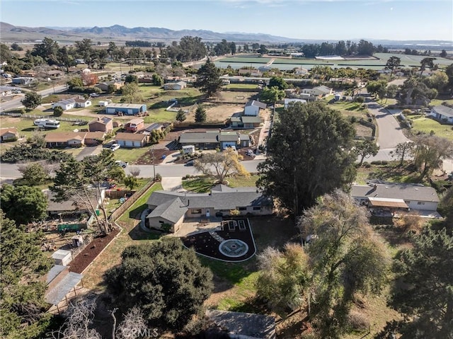 drone / aerial view featuring a mountain view