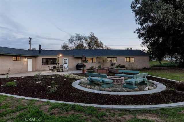 rear view of property with a patio area