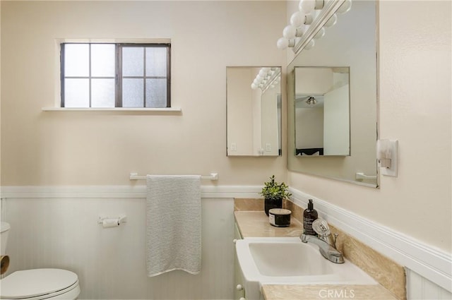 bathroom with sink and toilet