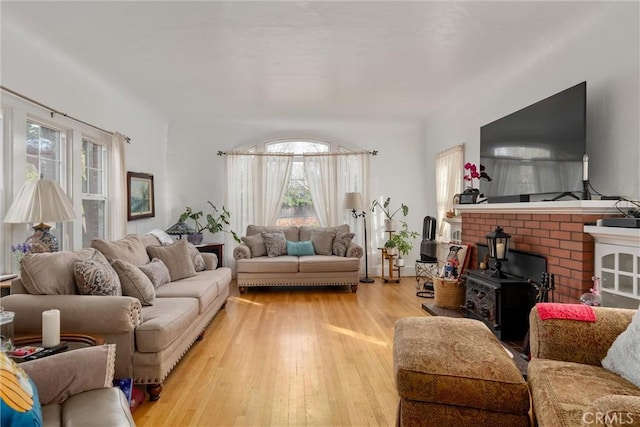 living room featuring a healthy amount of sunlight and light wood-type flooring