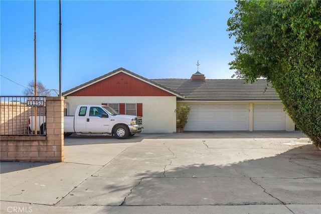 ranch-style home with a garage