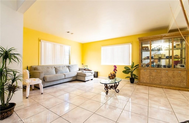 living room featuring light tile patterned flooring