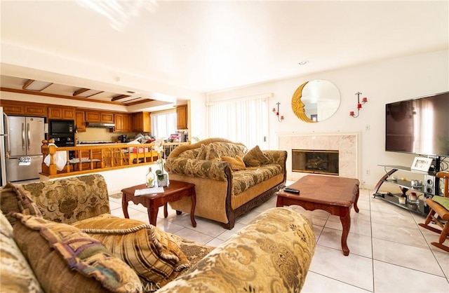 tiled living room with a fireplace