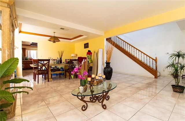 living room with light tile patterned flooring