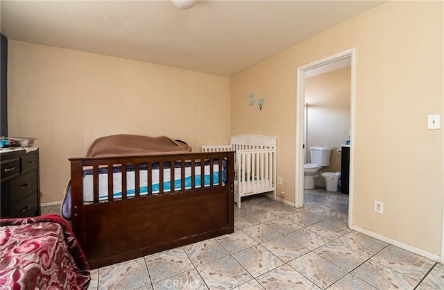 bedroom with ensuite bathroom