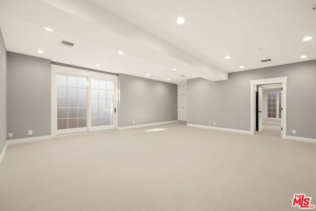 basement with light colored carpet