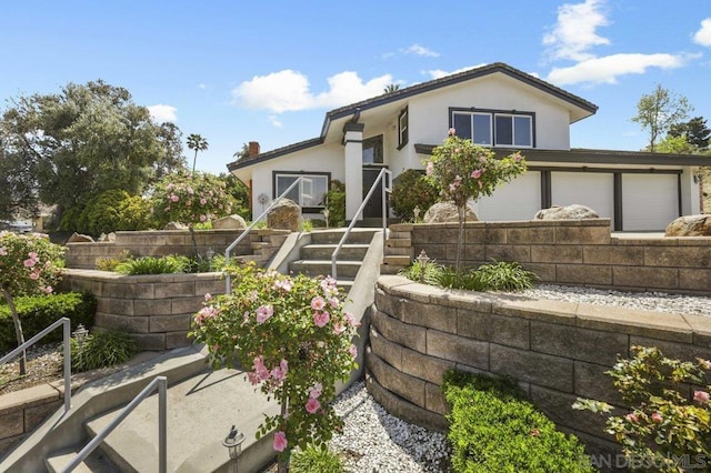 view of front of property featuring a garage