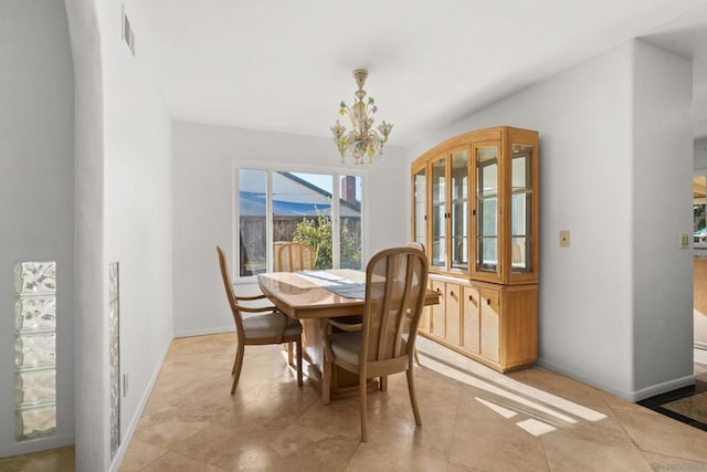 dining space with light tile patterned flooring