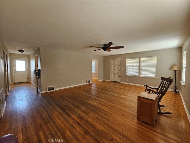 interior space with hardwood / wood-style flooring and ceiling fan