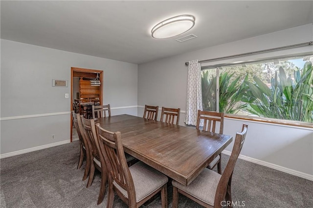 dining area with carpet