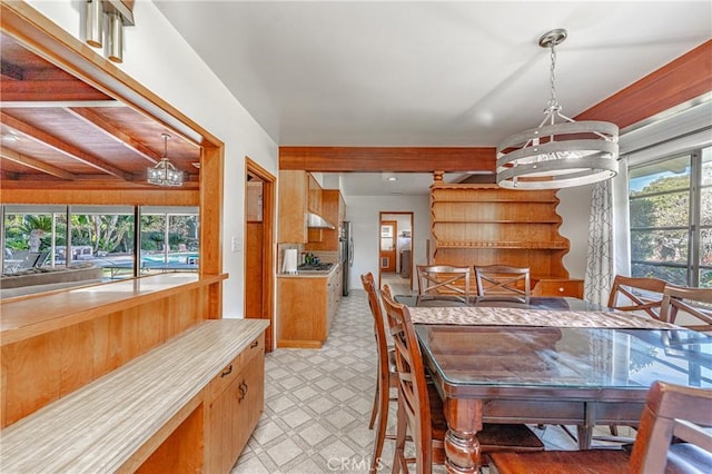 dining room featuring a chandelier