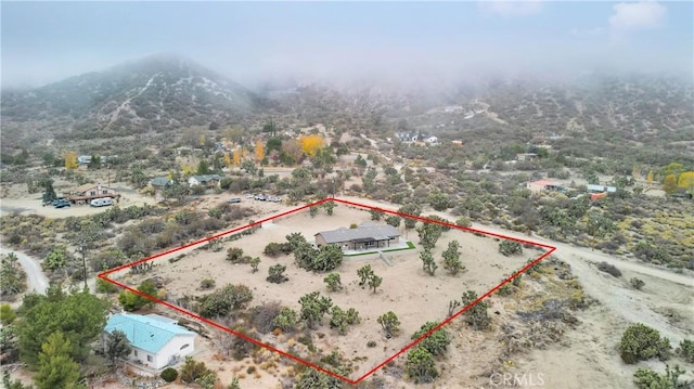 aerial view featuring a mountain view