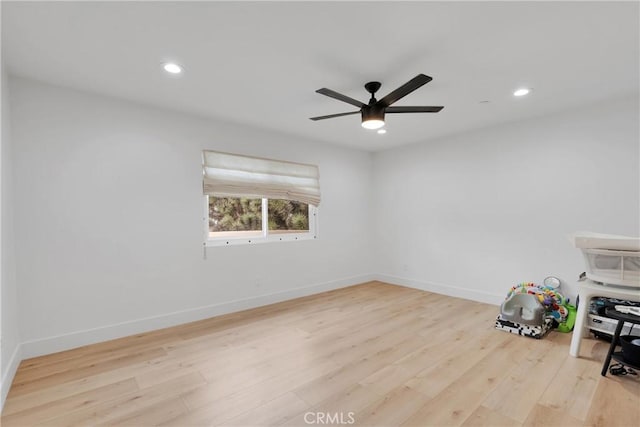 unfurnished room featuring ceiling fan and light wood-type flooring