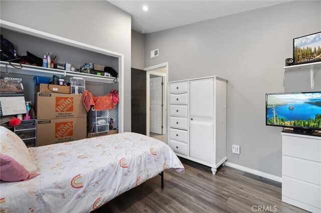 bedroom featuring dark hardwood / wood-style floors