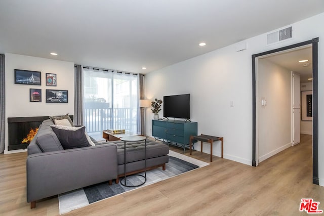 living room with light wood-type flooring